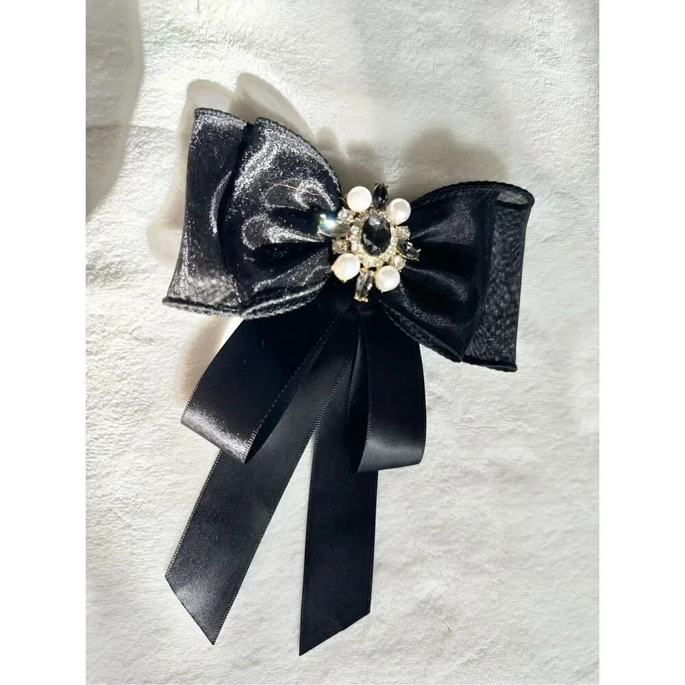 Black bow brooch with rhinestone and faux pearl